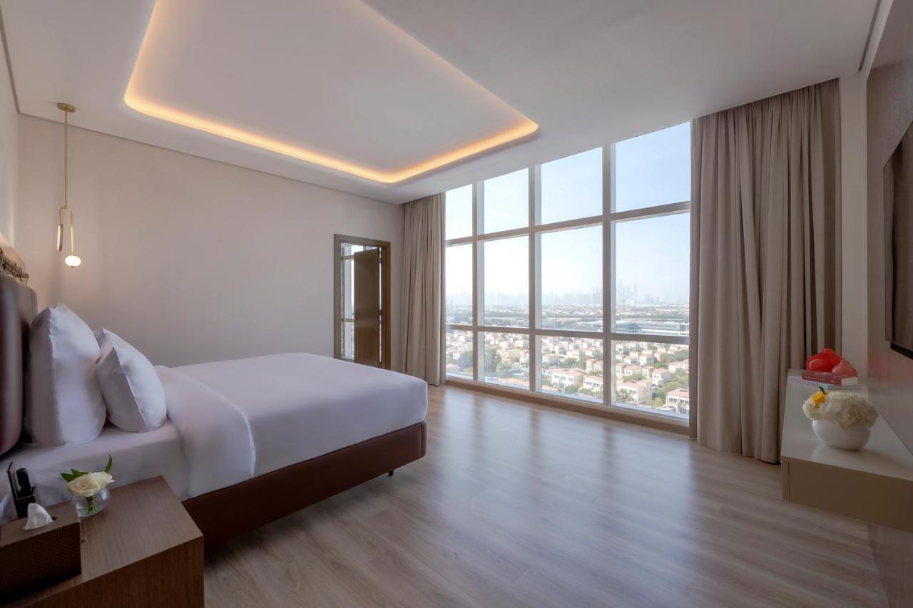 Movenpick Jumeirah Village Triangle دبي المظهر الخارجي الصورة Suite bedroom