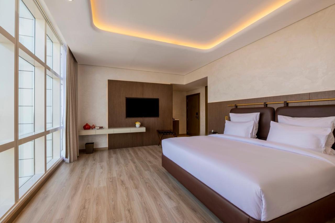 Movenpick Jumeirah Village Triangle دبي المظهر الخارجي الصورة