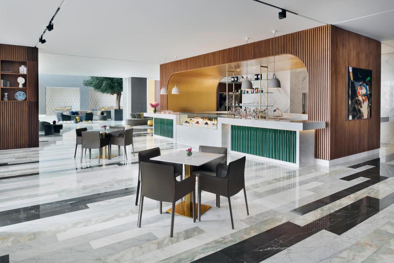 Movenpick Jumeirah Village Triangle دبي المظهر الخارجي الصورة Interior of the hotel