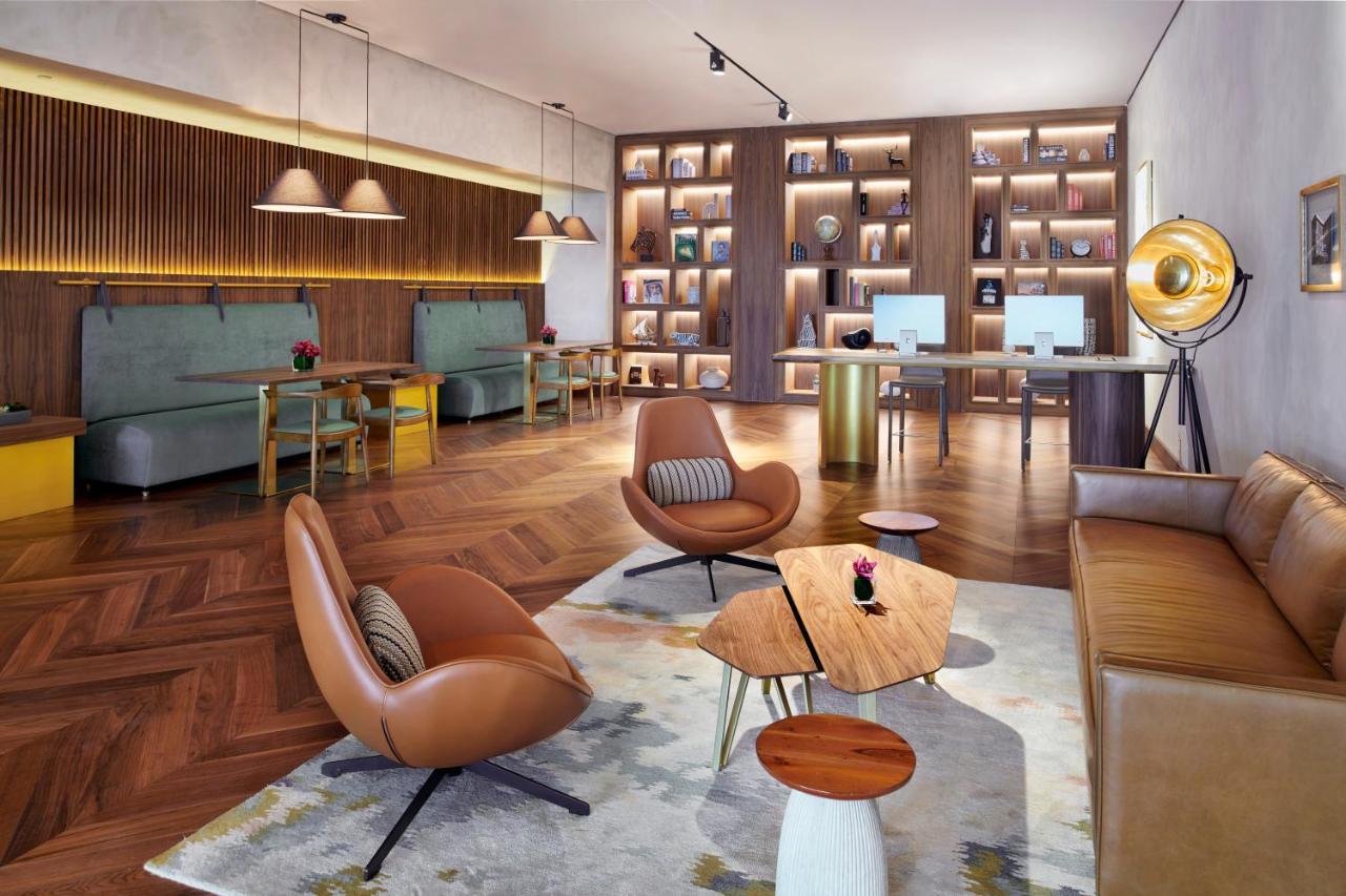 Movenpick Jumeirah Village Triangle دبي المظهر الخارجي الصورة The Library at The Hari