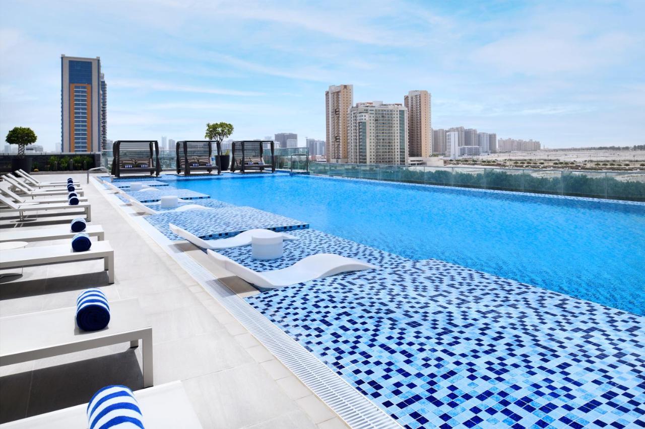 Movenpick Jumeirah Village Triangle دبي المظهر الخارجي الصورة Rooftop pool